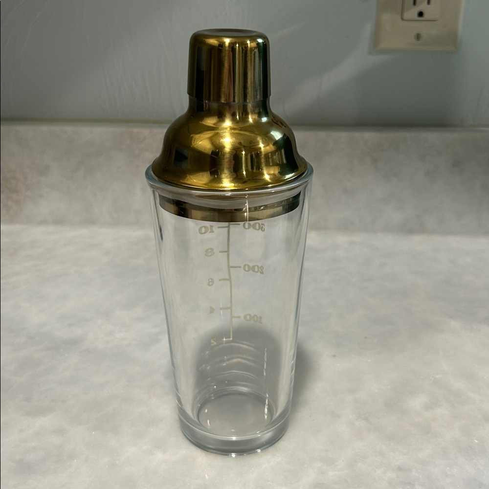 Gold Metal and Glass Cocktail Shaker